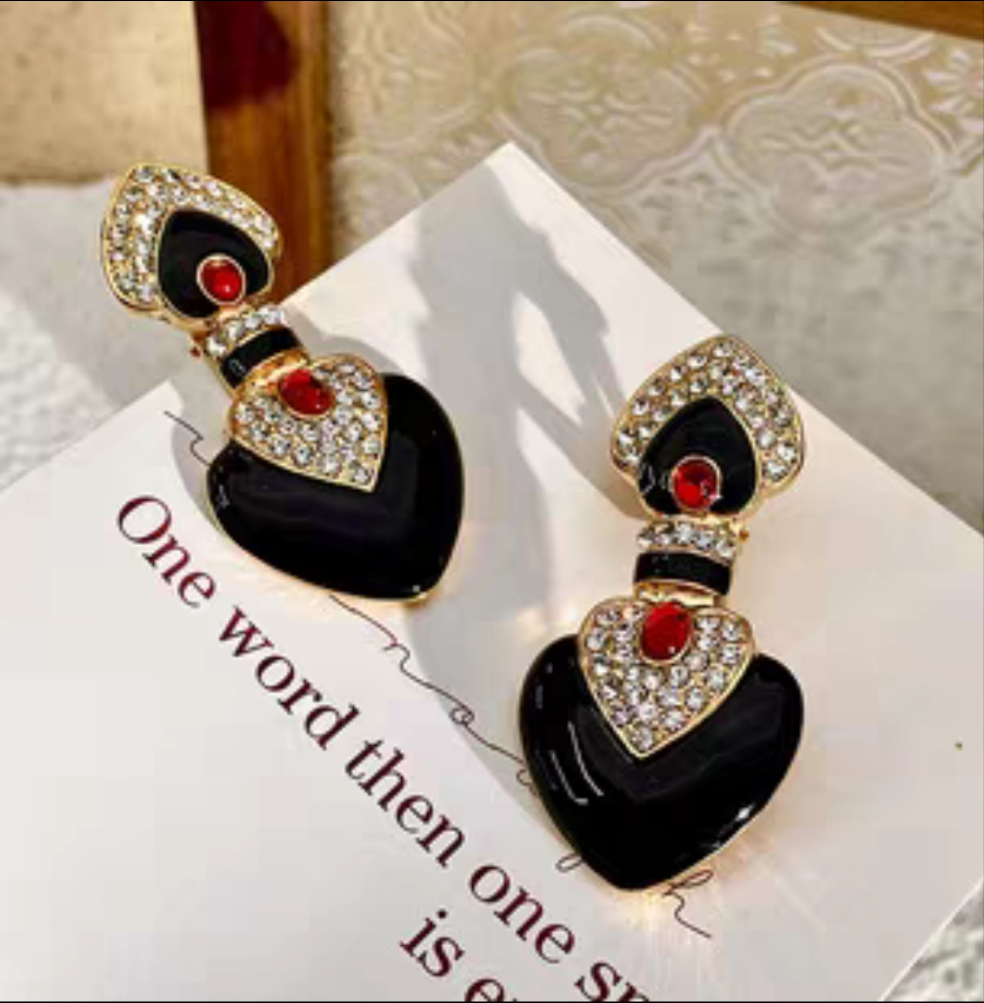 Black enamel with red colored glaze ethnic style clip earrings