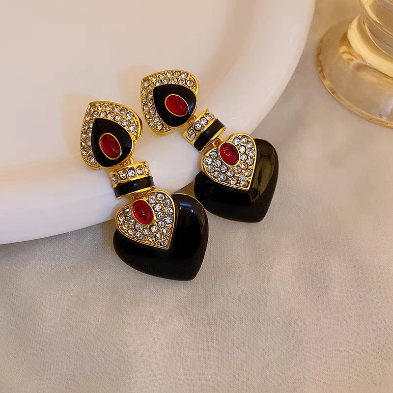 Black enamel with red colored glaze ethnic style clip earrings