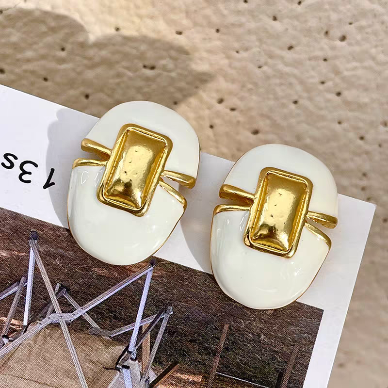 Classic white and gold vintage style earrings