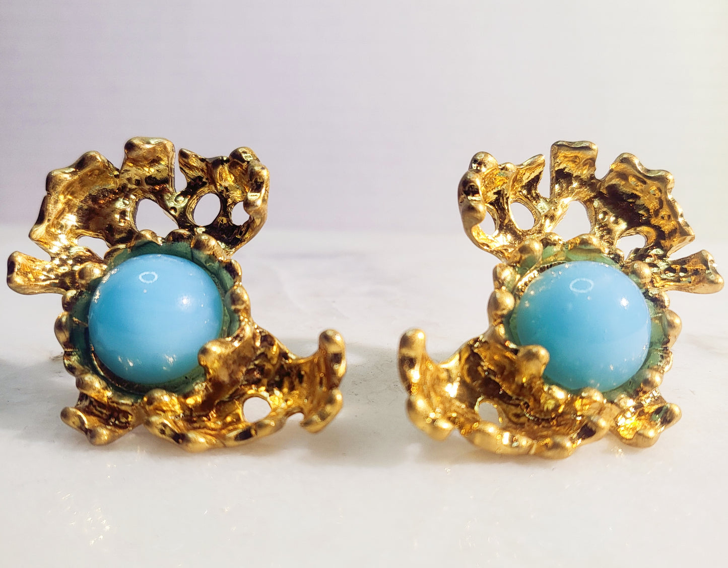 Light blue stone in irregular shape clip earrings perfect with jeans