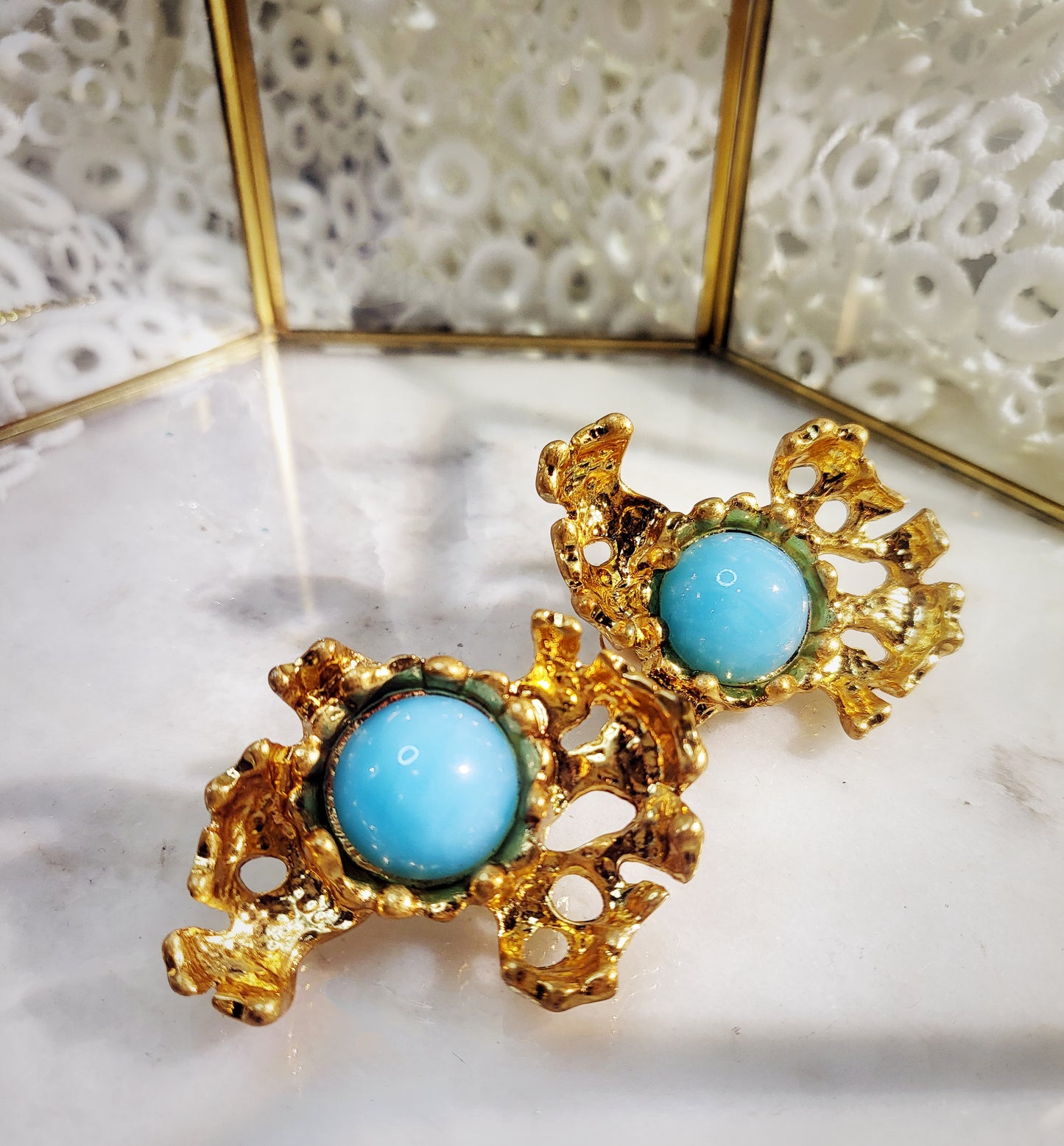 Light blue stone in irregular shape clip earrings perfect with jeans